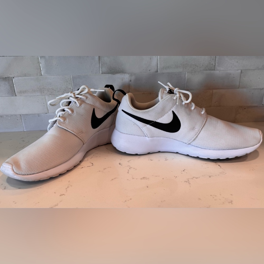 Nike White Athletic Shoes with Black Logo